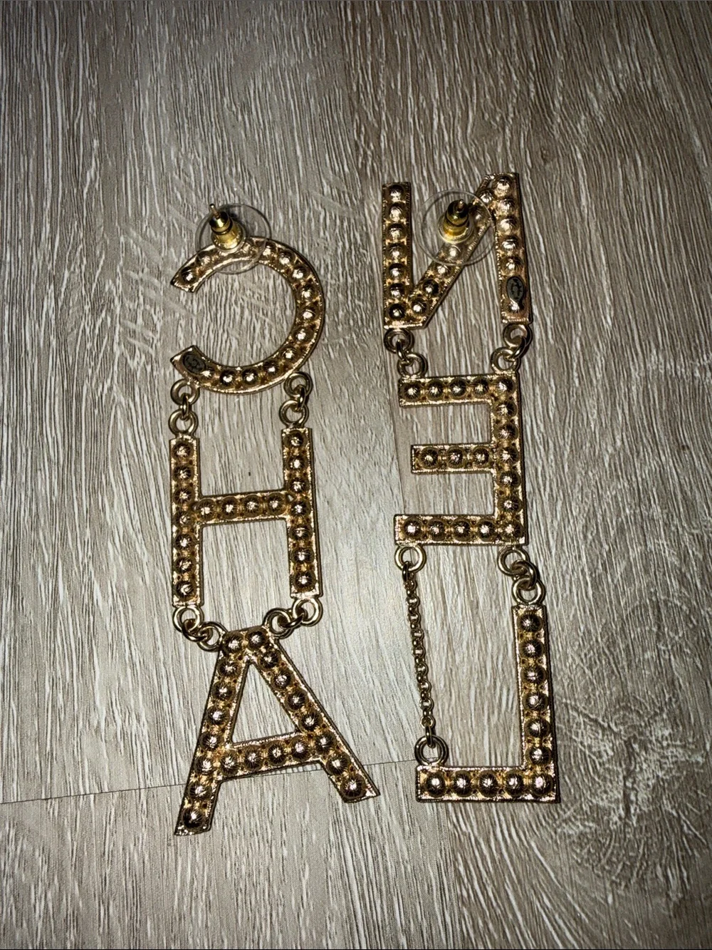 CHANEL Gold Crystal Logo Dangle Earrings